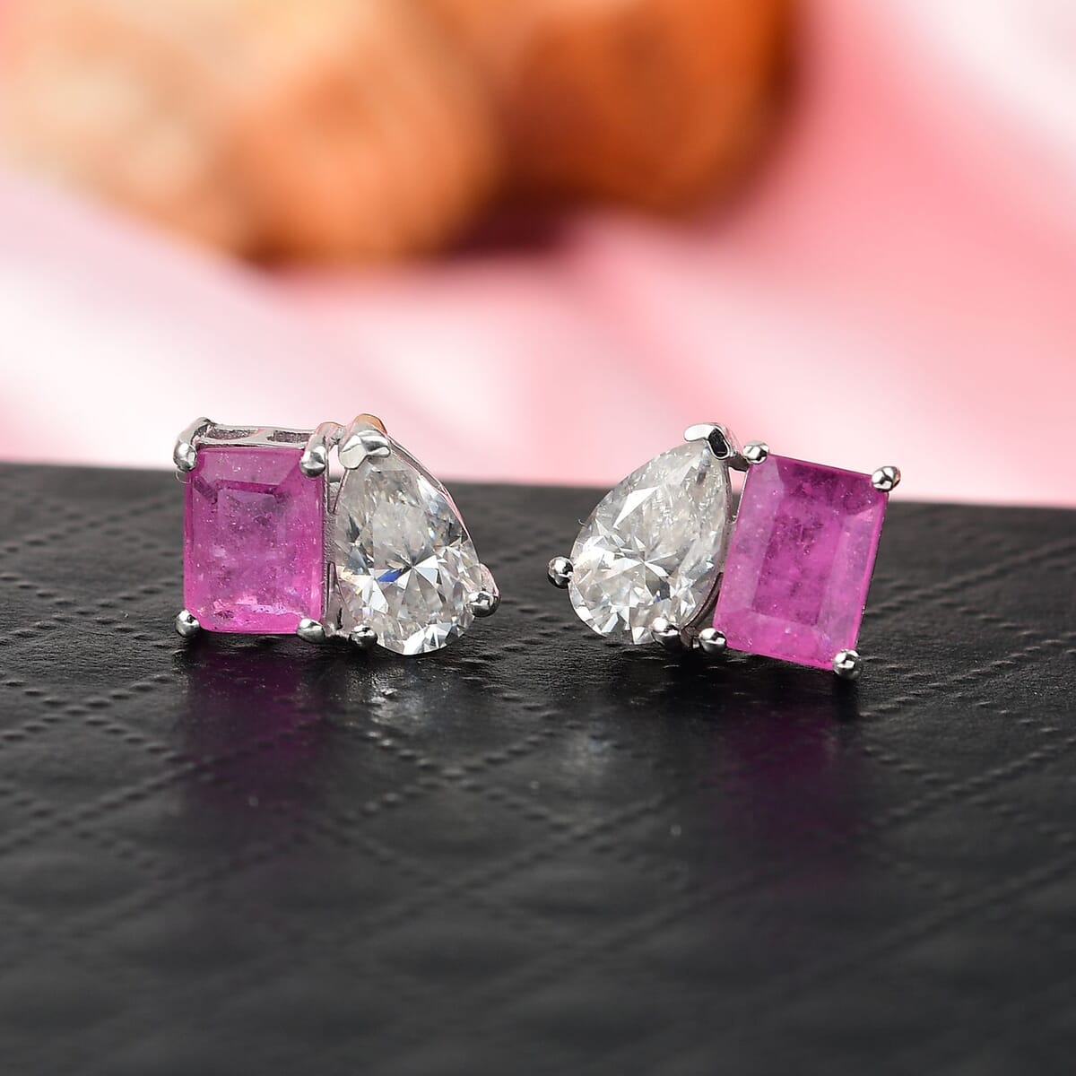 D'Joy Premium Ilakaka Hot Pink Sapphire (FF) and Moissanite 4.15 ctw Toi et Moi Earrings in Rhodium Over Sterling Silver image number 1