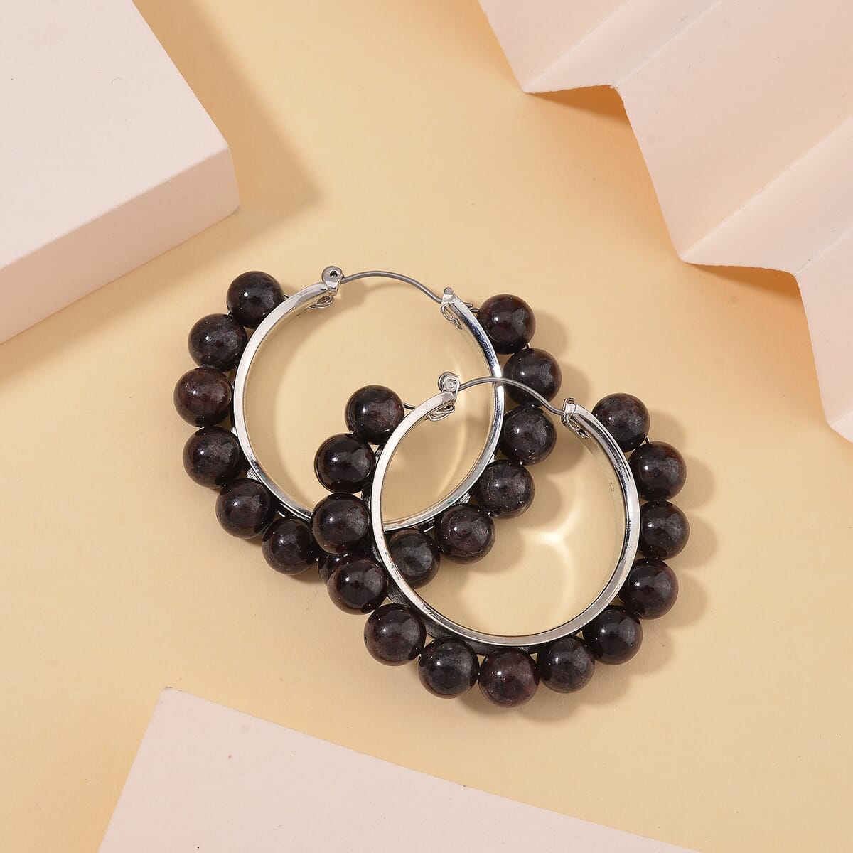 Mozambique Garnet 35 ctw Hoop Earrings in Silvertone image number 1