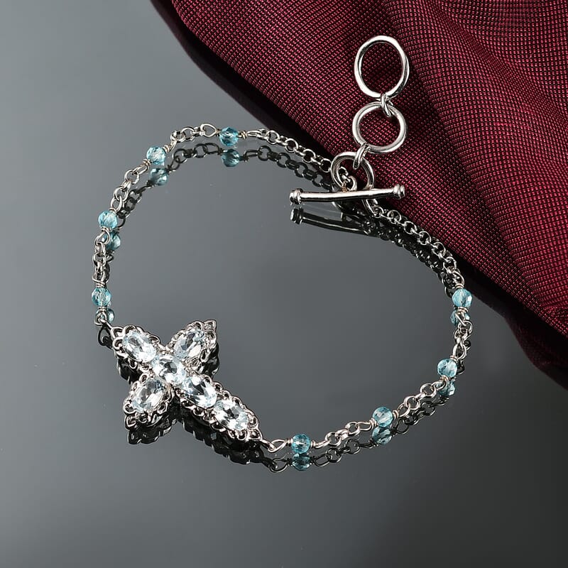 EverTrue Sky Blue Topaz 4.30 ctw Cross Bracelet in Platinum Bond (6.50-8.0In)