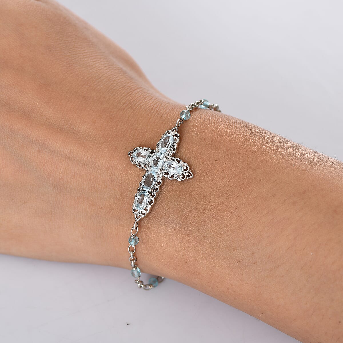 EverTrue Sky Blue Topaz 4.30 ctw Cross Bracelet in Platinum Bond (6.50-8.0In) image number 2