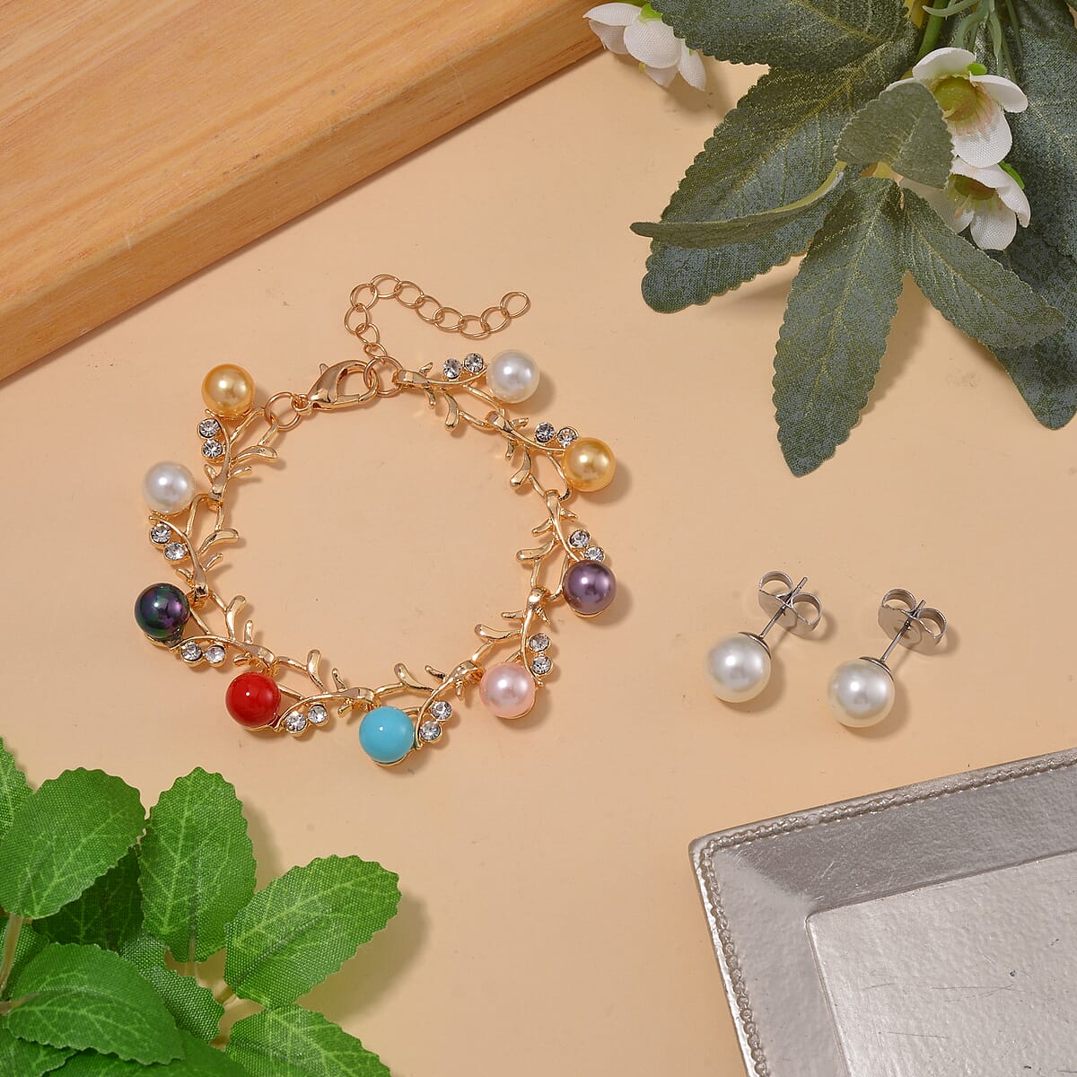 Multi Color Shell Pearl and Austrian Crystal Blossom Vine Bracelet in Goldtone (6.50-8.50In) image number 1