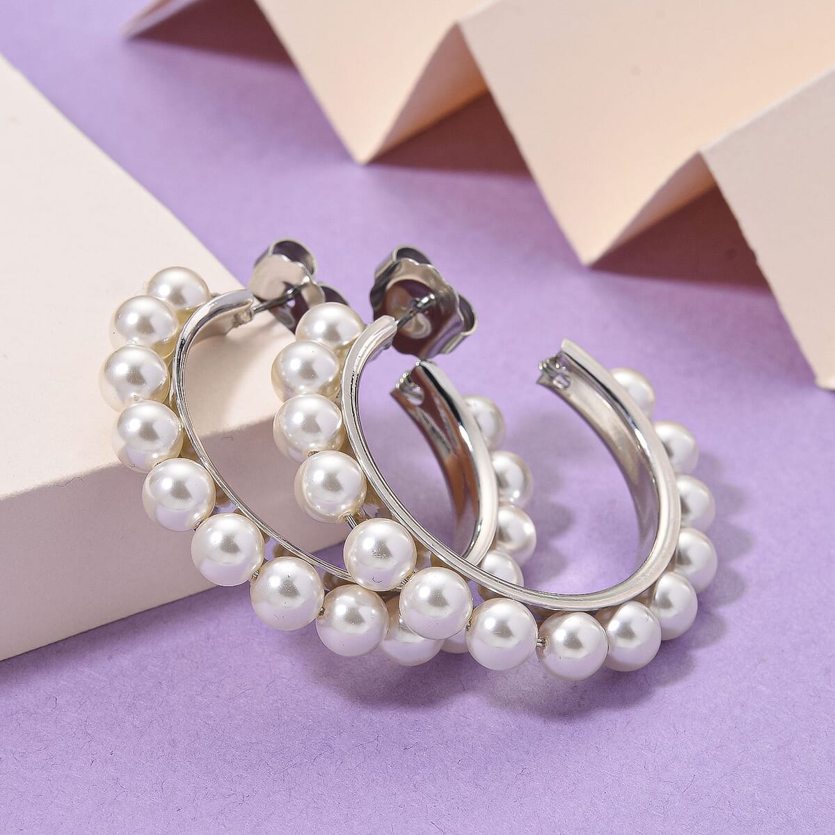 White Shell Pearl Hoop Earrings in Silvertone and Stainless Steel image number 1