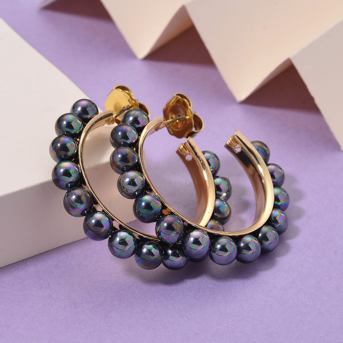 Peacock Color Shell Pearl Hoop Earrings in Goldtone and ION Plated YG Stainless Steel image number 1