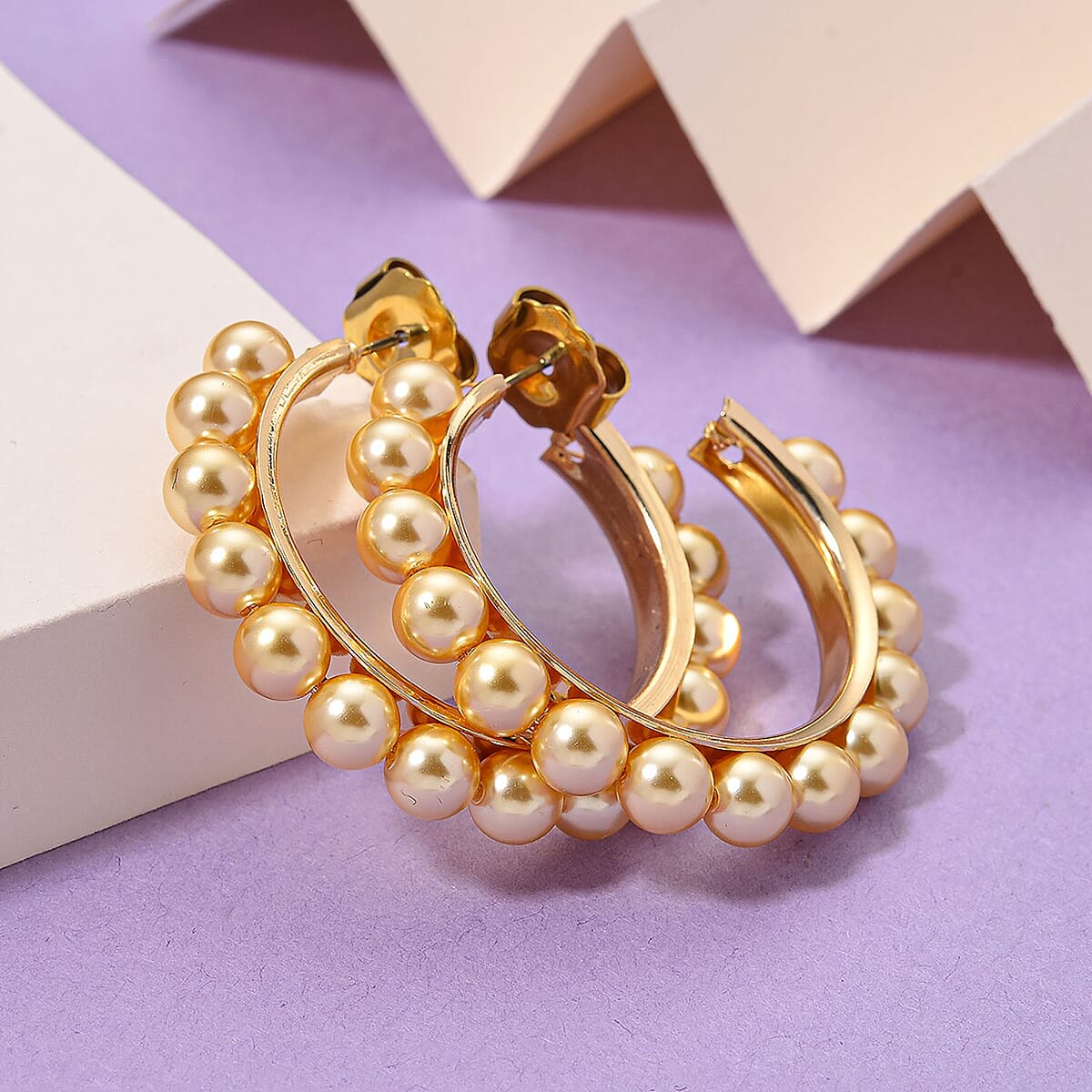 Golden Color Shell Pearl Hoop Earrings in Goldtone and ION Plated YG Stainless Steel image number 1