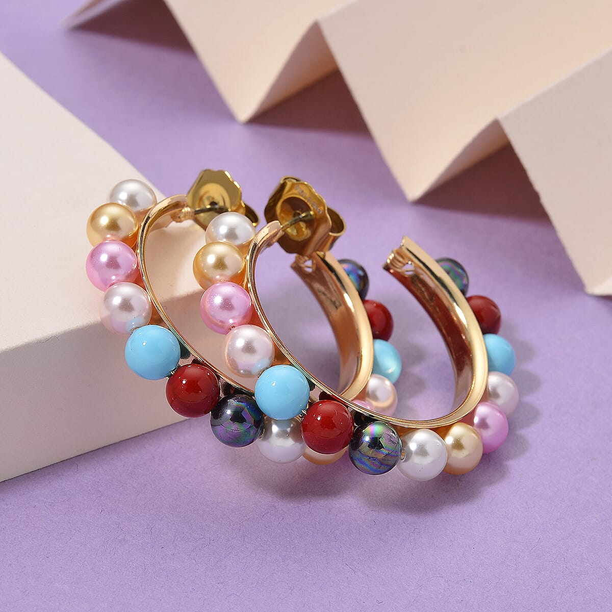 Doorbuster Multi Color Shell Pearl Hoop Earrings in Goldtone and ION Plated YG Stainless Steel image number 1