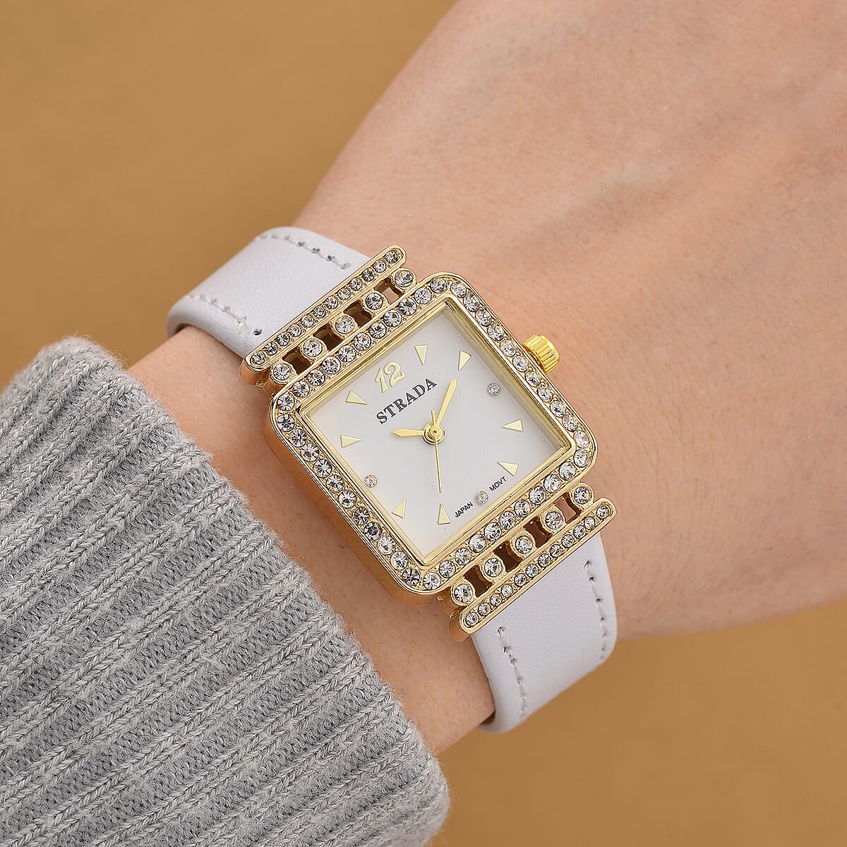 Strada Austrian Crystal Japanese Movement Watch with White Faux Leather Strap image number 1