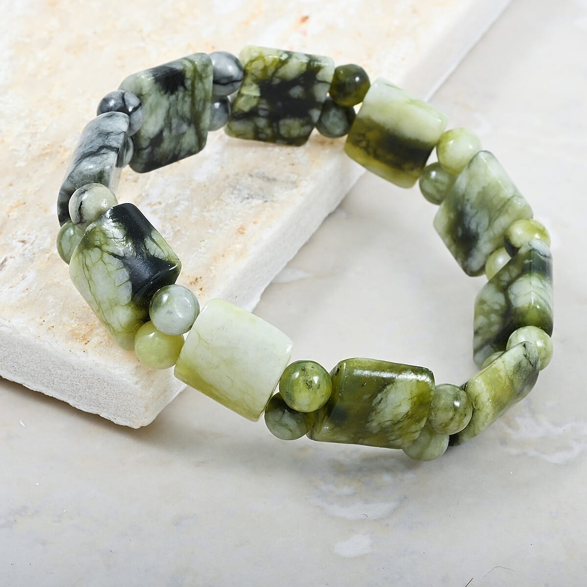 Snowflake Serpentine 159.45 ctw Tanker Plain Stretch Bracelet (6-7In) image number 1