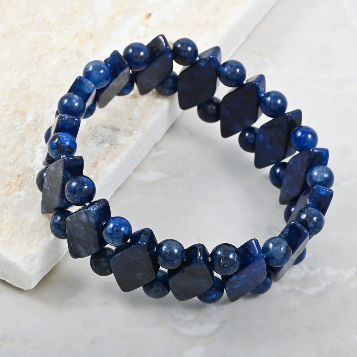 Blue Lapis Lazuli 164.95 ctw Kiwi Plain Princess Stretch Bracelet (6-7In) image number 1