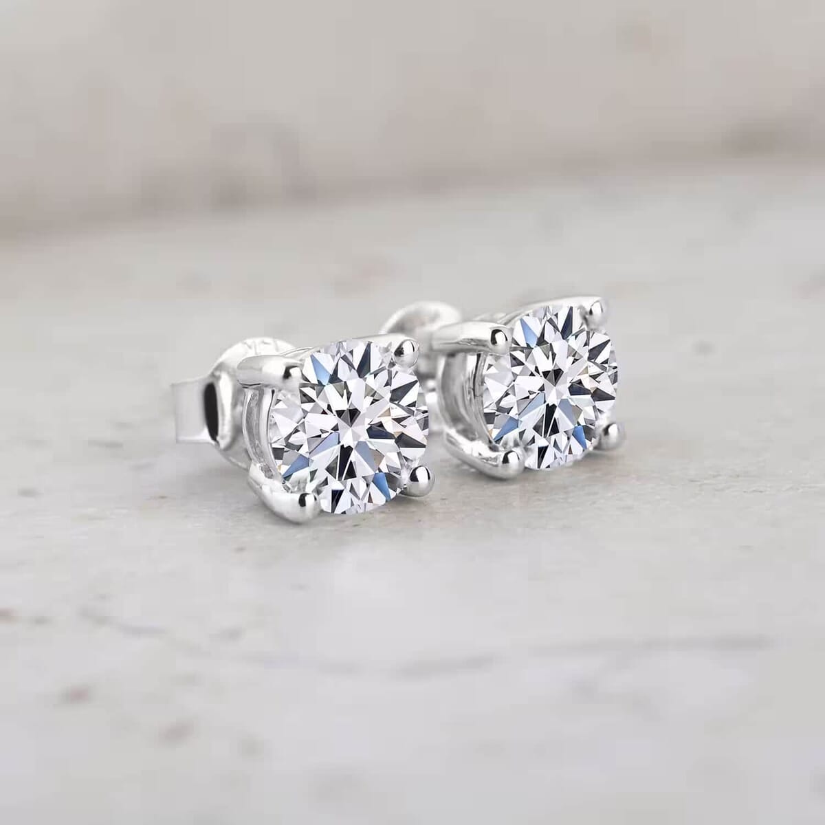 Luxuriant Lab Grown Diamond E-F VS 0.50 ctw Solitaire Stud Earrings in Rhodium Over Sterling Silver image number 1