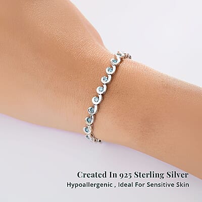 Luxuriant Lab Grown Blue Diamond (IR) 2.80 ctw Waves of Light Bracelet in Rhodium Over Sterling Silver (6.50 In)