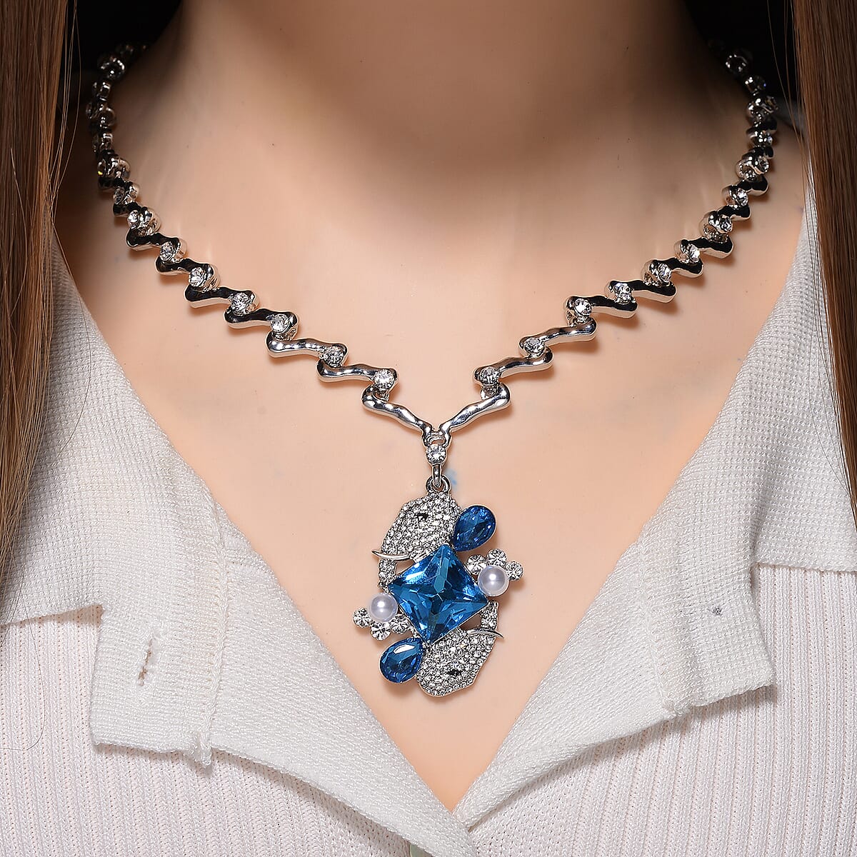 Blue Glass, Simulated Pearl and Austrian Crystal Elephant Necklace in Silvertone 20-22 Inches image number 1