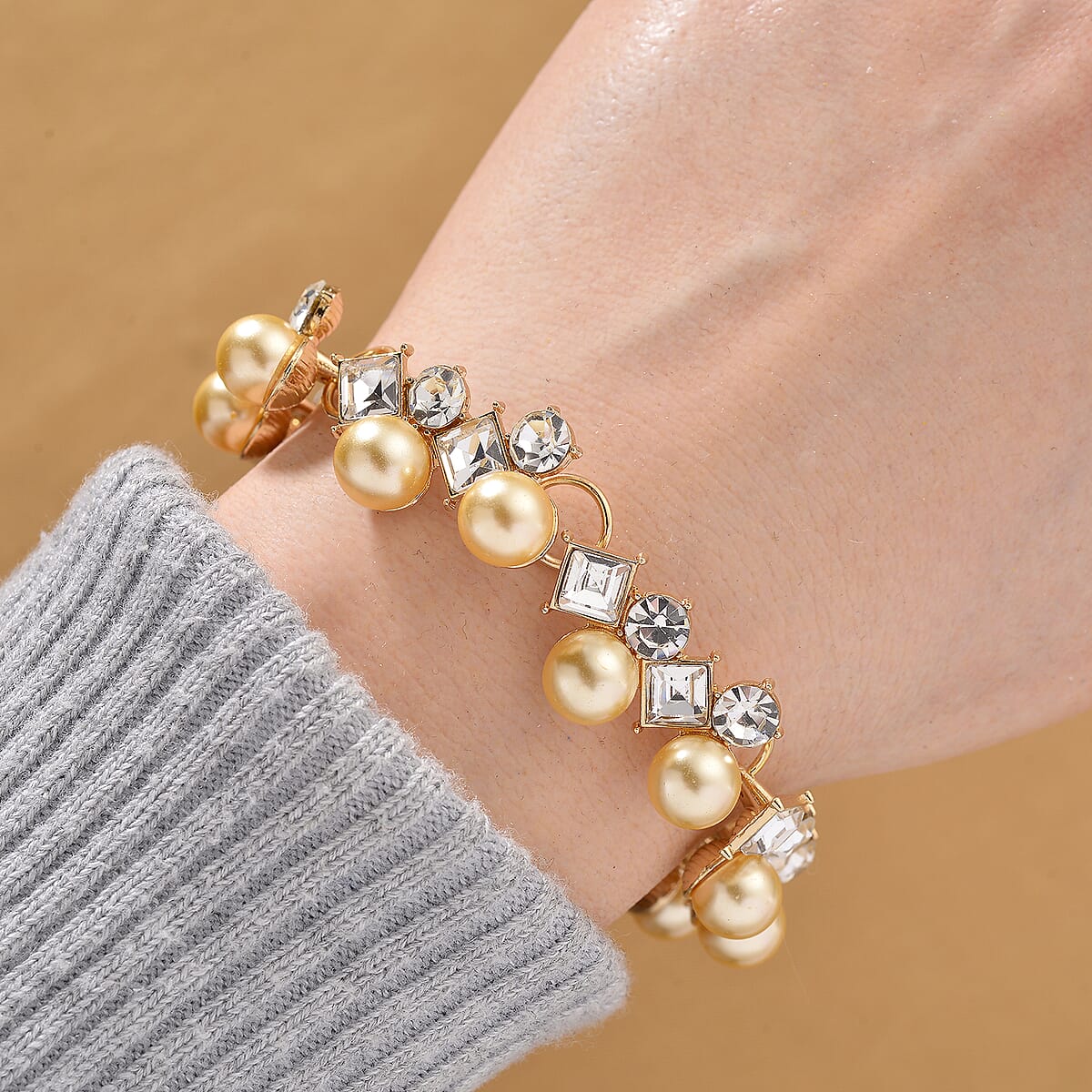 Golden Shell Pearl and Austrian Crystal Bracelet in Goldtone (6.50-8.0In) image number 1