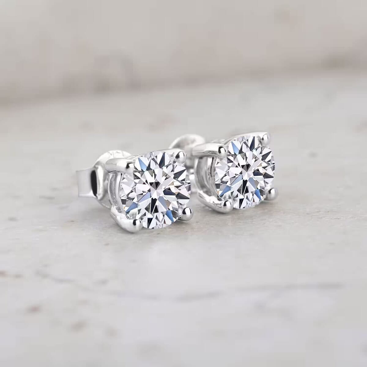 Luxuriant Lab Grown Diamond E-F VS 0.50 ctw Solitaire Stud Earrings in 14K White Gold image number 1