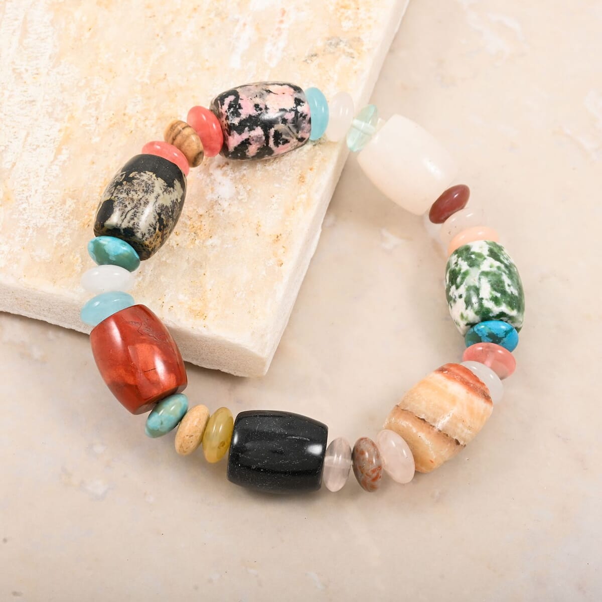 Multi-Stone 174.45 ctw Barrel/Rondell Stretch Bracelet (6-7In) image number 1