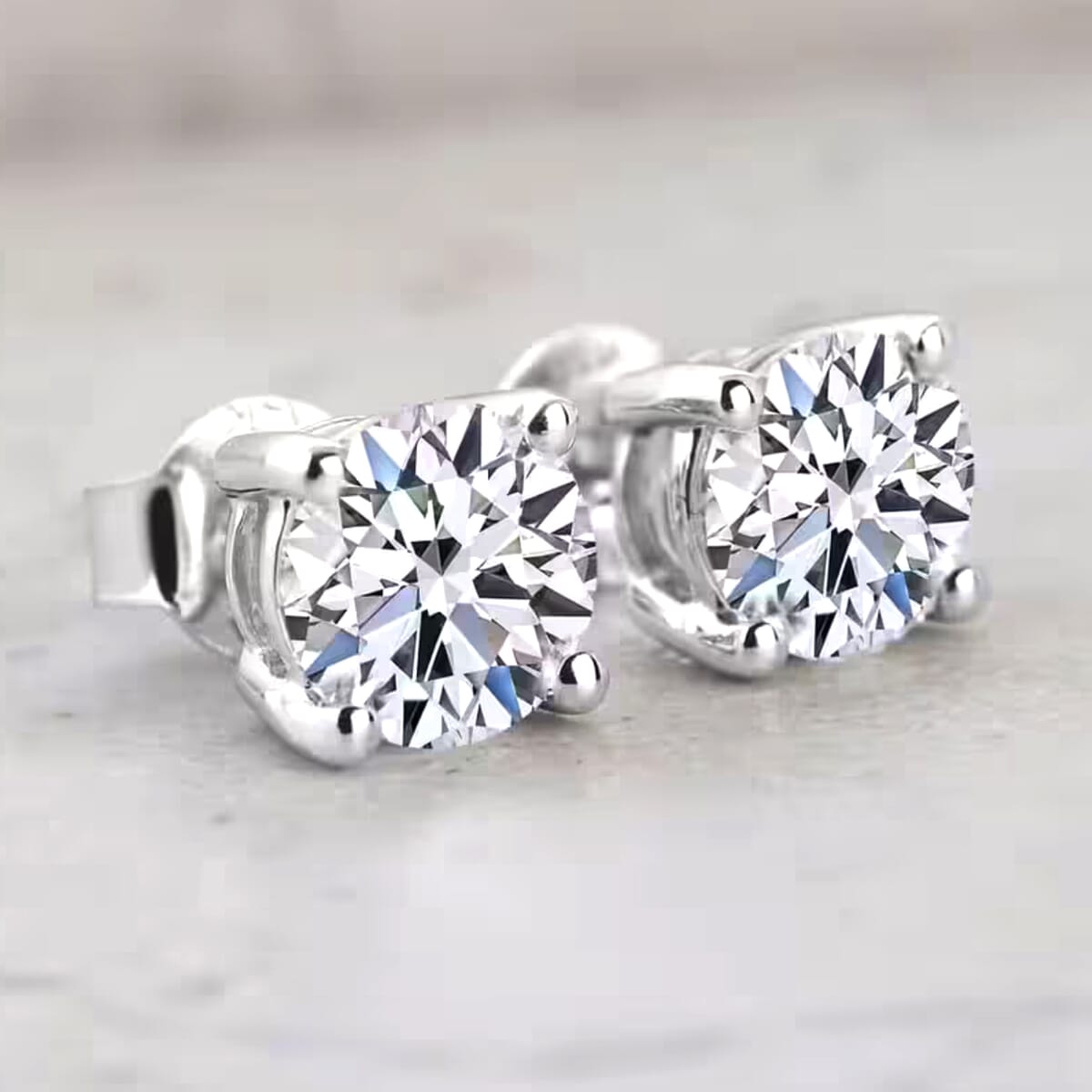 IGI Certified Luxuriant Lab Grown Diamond E-F VS 4.00 ctw Solitaire Stud Earrings in 14K White Gold image number 9