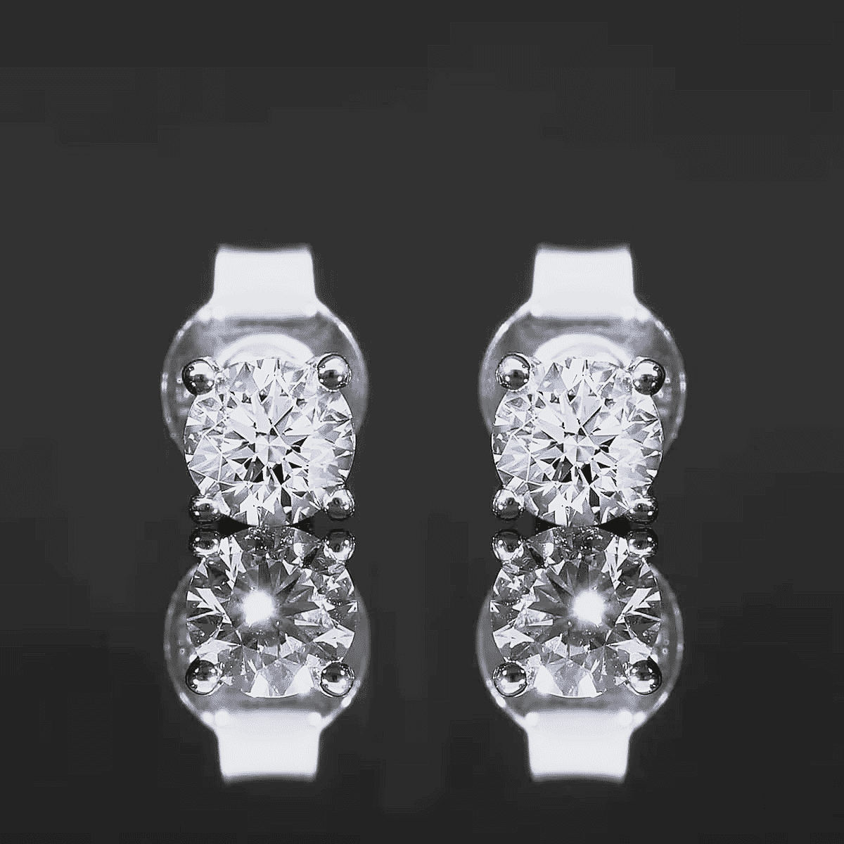 IGI Certified Luxuriant Lab Grown Diamond E-F VS 1.00 ctw Solitaire Stud Earrings in Rhodium Over Sterling Silver image number 4