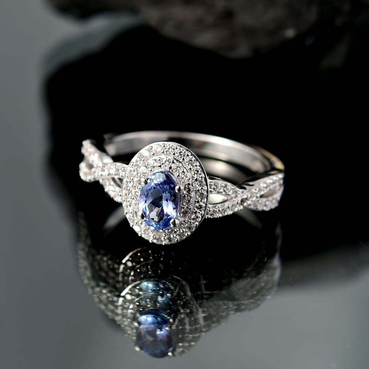 D’Joy Peacock Tanzanite and White Zircon 1.10 ctw Infinity Ring in Rhodium Over Sterling Silver (Size 10.0) image number 1