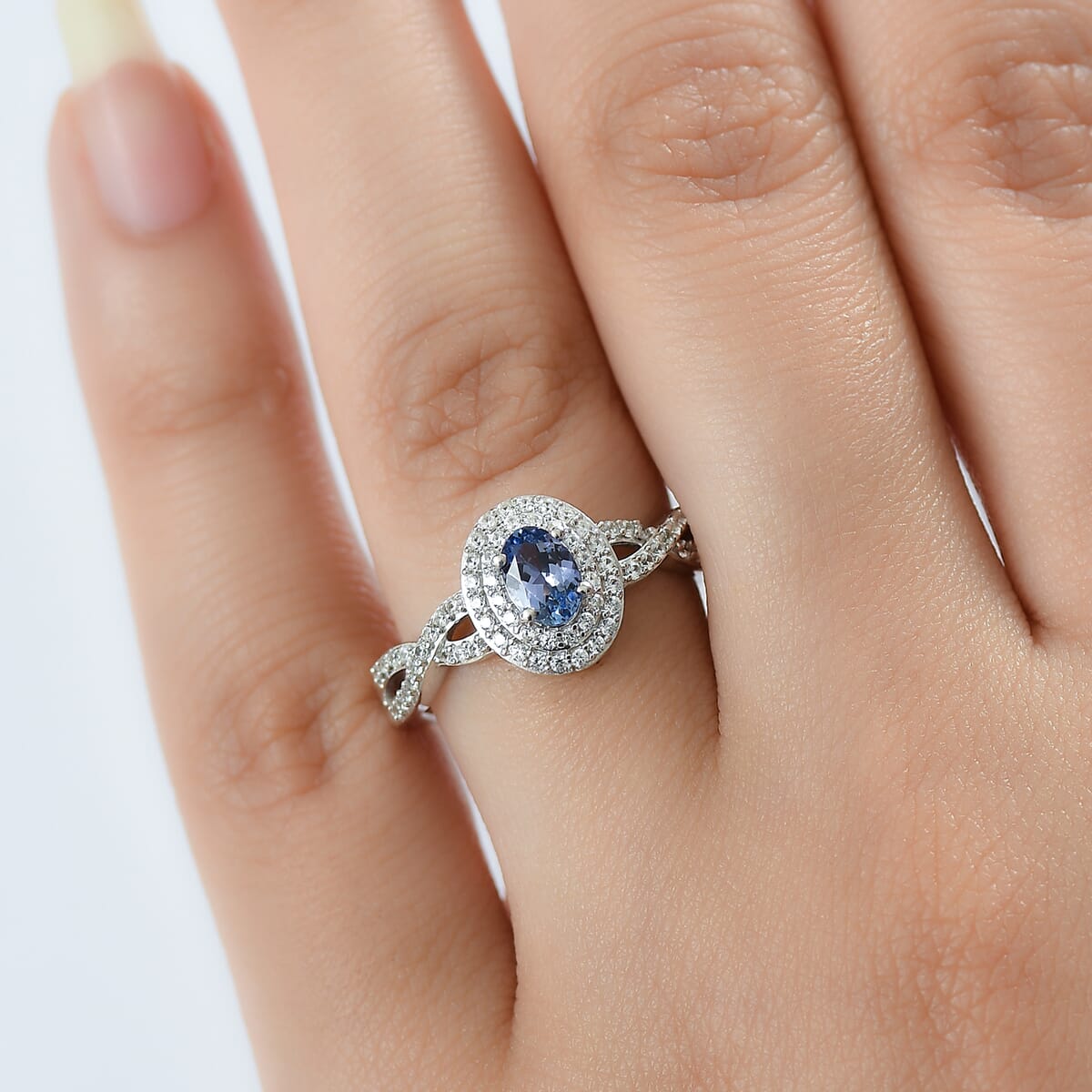 D’Joy Peacock Tanzanite and White Zircon 1.10 ctw Infinity Ring in Rhodium Over Sterling Silver (Size 10.0) image number 2
