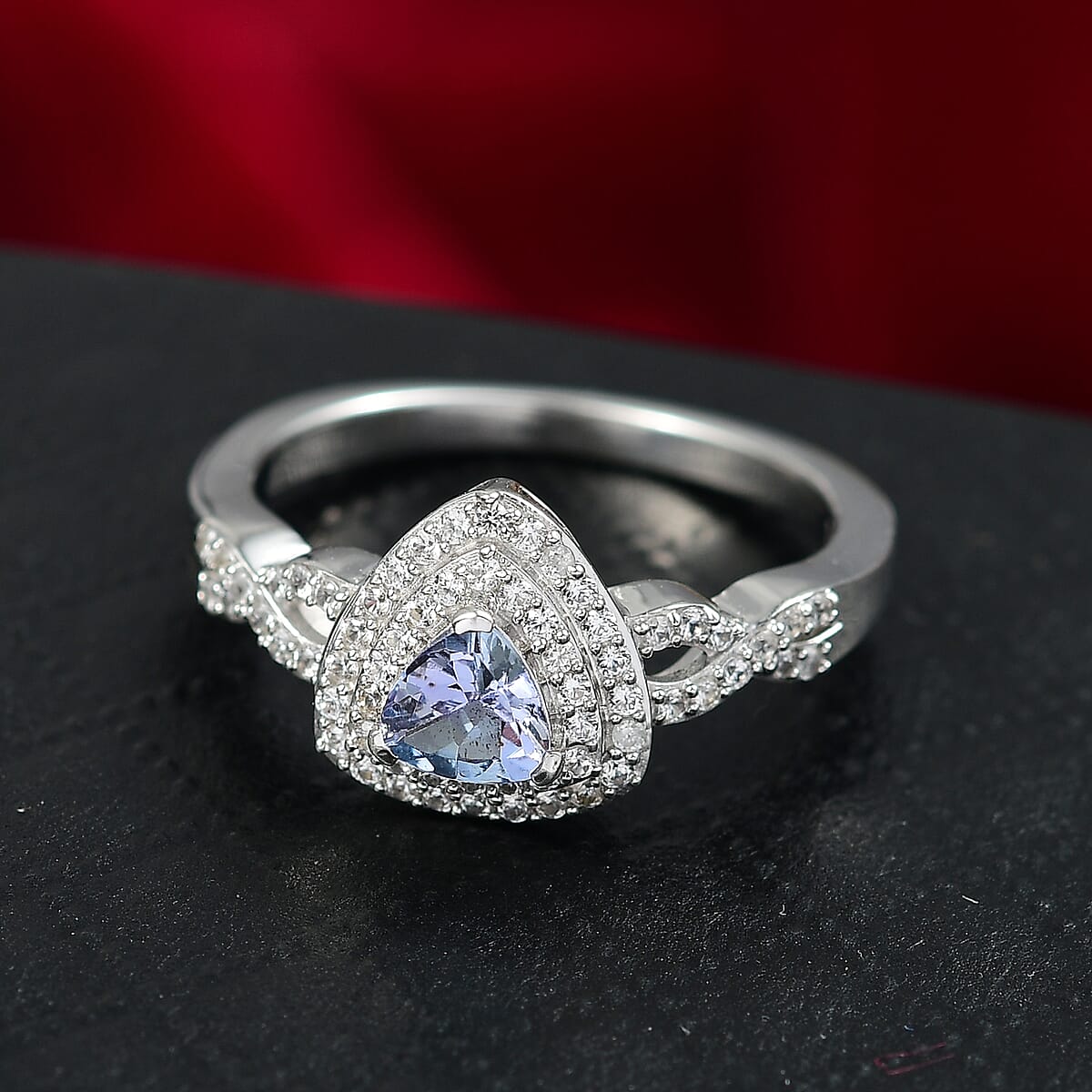 D'Joy Peacock Tanzanite and White Zircon 1.00 ctw Infinity Ring in Rhodium Over Sterling Silver (Size 7.0) image number 1