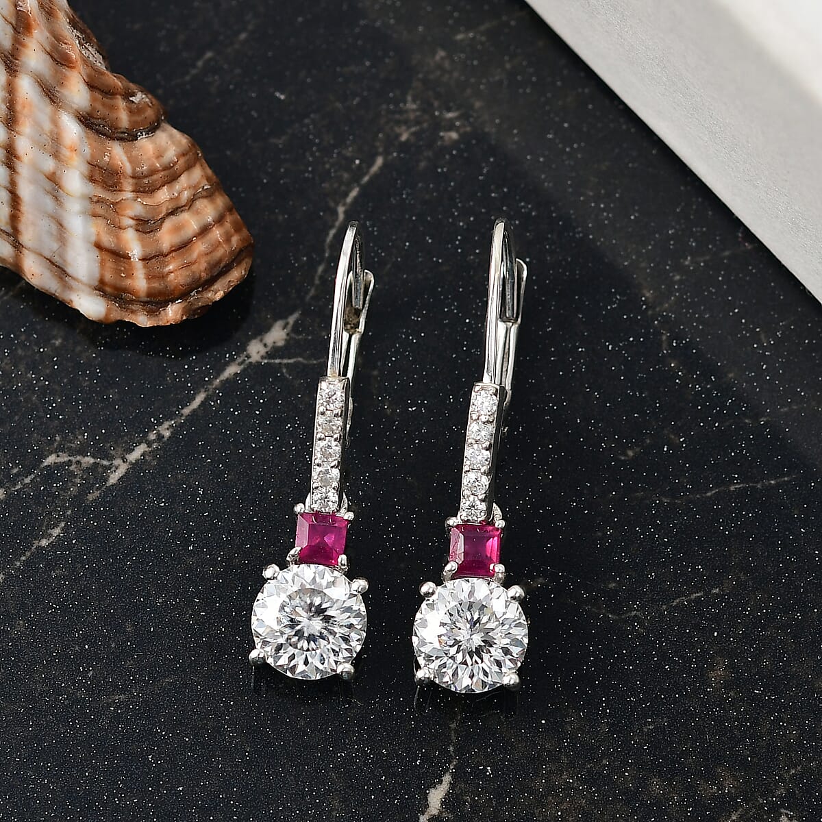 D'Joy 120 Faceted Moissanite and Niassa Ruby (FF) 3.20 ctw Lever Back Earrings in Rhodium Over Sterling Silver image number 1