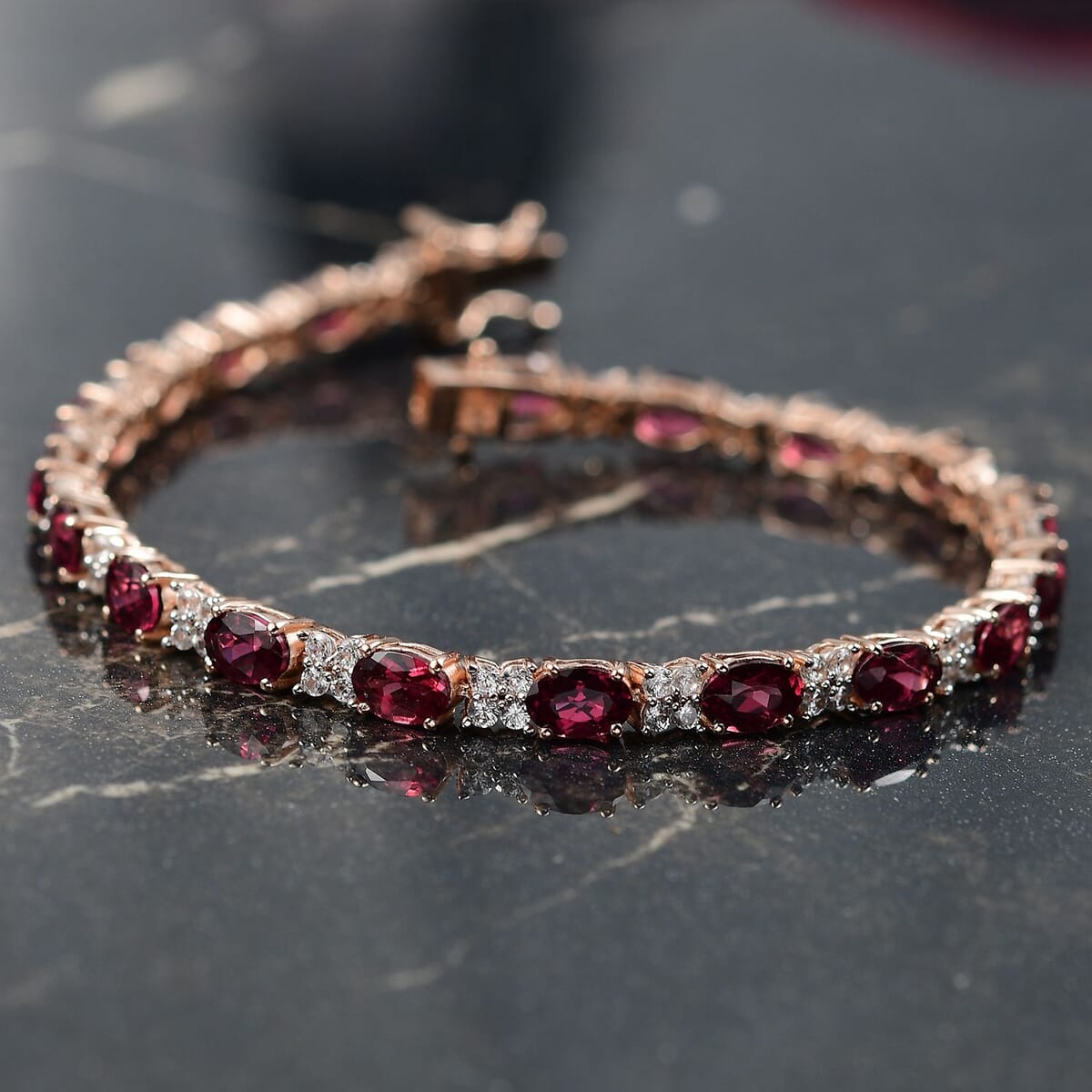 D'Joy Premium Tanzanian Wine Garnet and White Zircon 13.00 ctw Eternal Flame Bracelet in 18K Vermeil Rose Gold Over Sterling Silver (7.25 In) image number 1