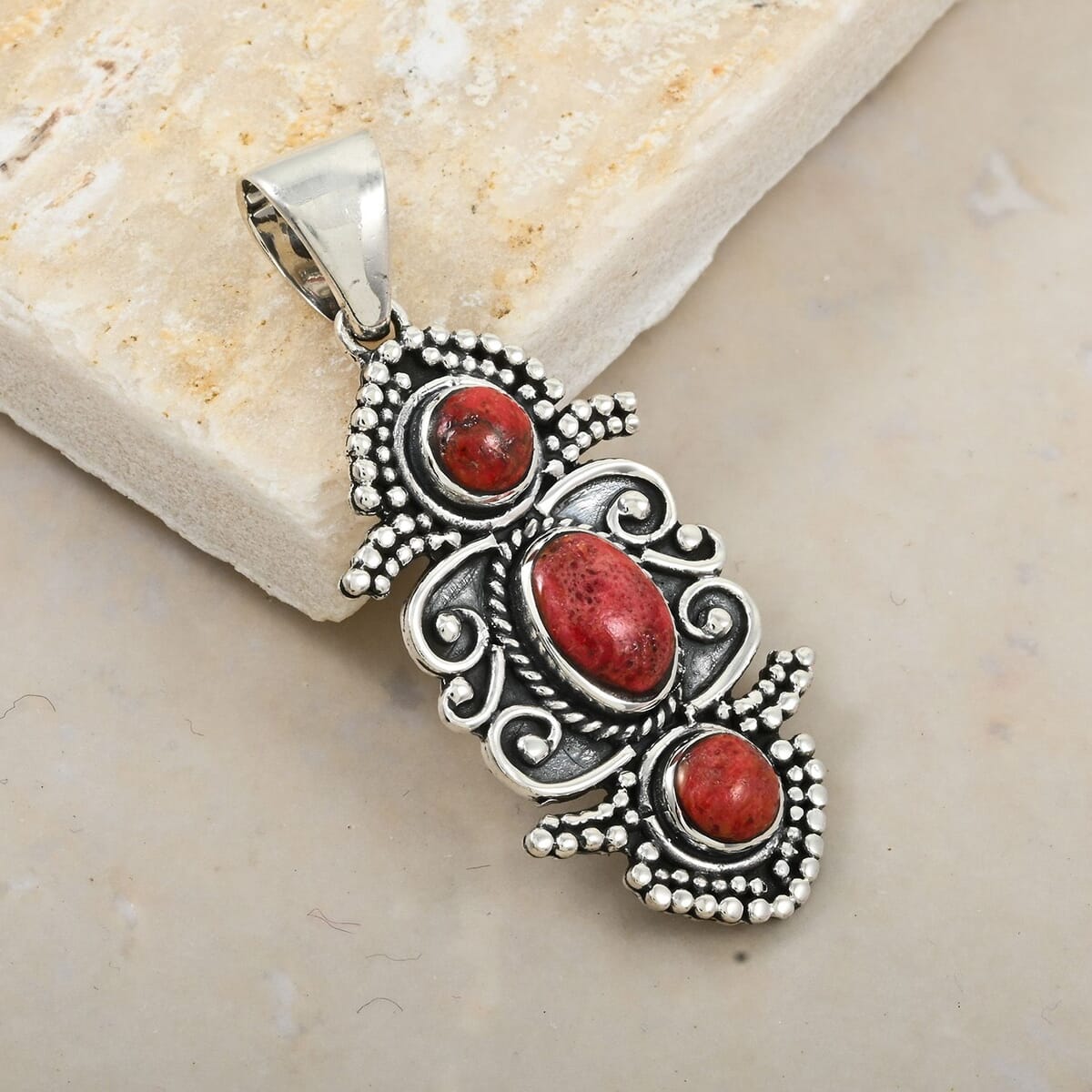 Santa Fe Style Enhanced Red Coral Pendant in Sterling Silver 5.50 ctw image number 1