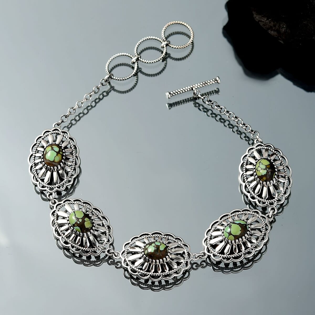 D’Joy Artisan Crafted Whispering Web Turquoise 6.10 ctw Concho Bracelet in Sterling Silver (6.50-8.0In) image number 1