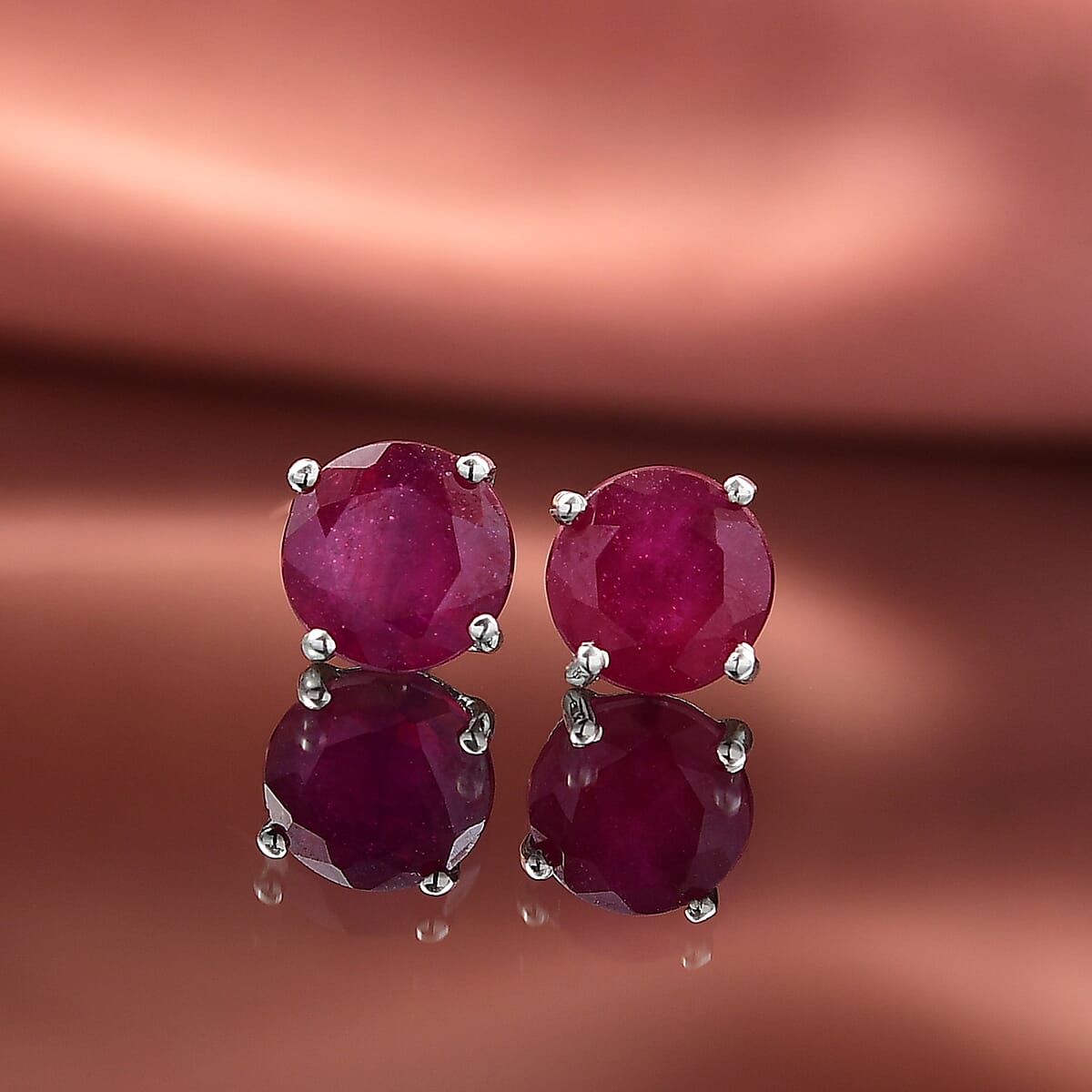 D'Joy Niassa Ruby (FF) 4.10 ctw Solitaire Stud Earrings in Rhodium Over Sterling Silver  image number 1