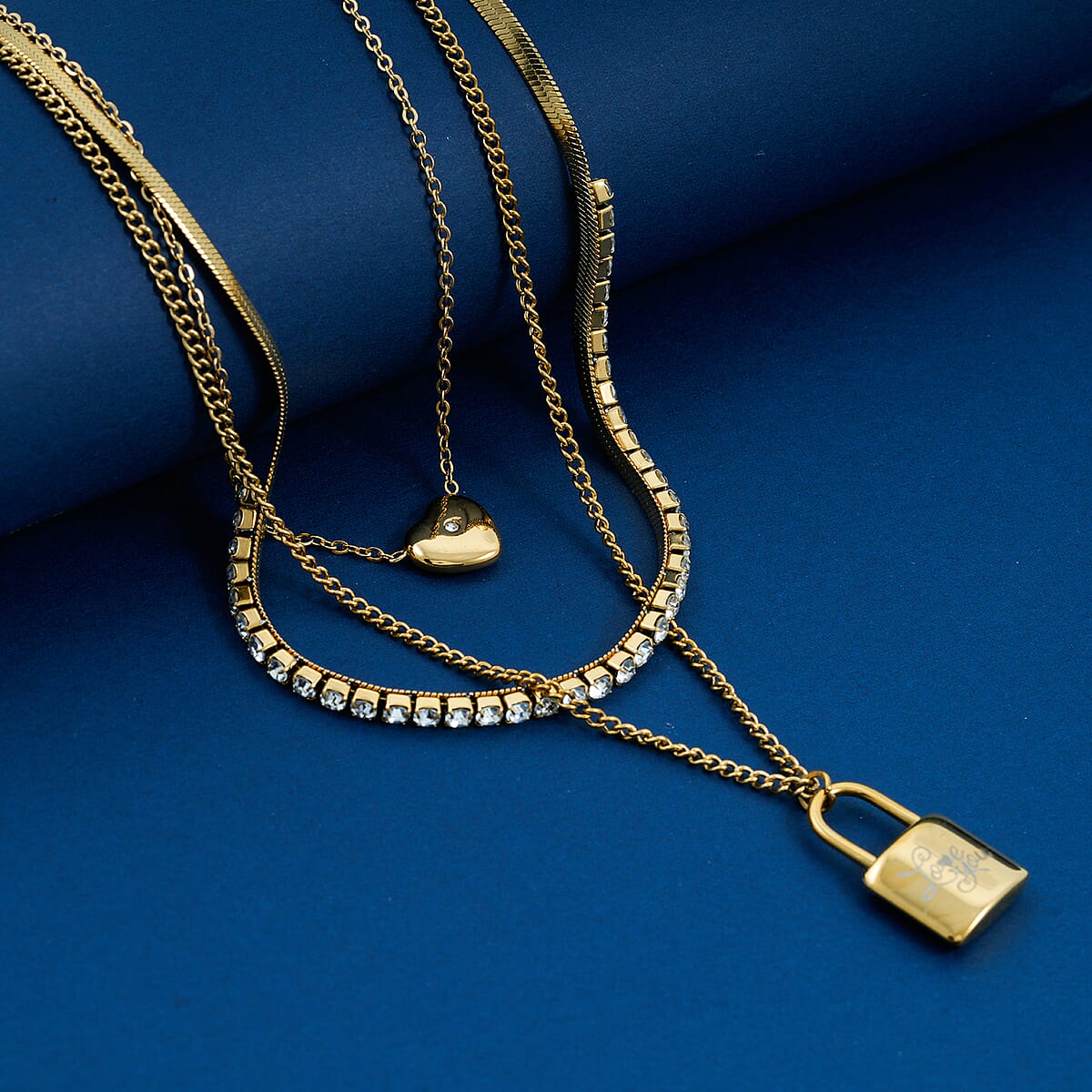 Austrian Crystal 3 Layered Lock and Heart Charm Necklace with 2 Inch Extender (16, 18 and 22 Inches) in ION Plated YG Stainless Steel image number 1