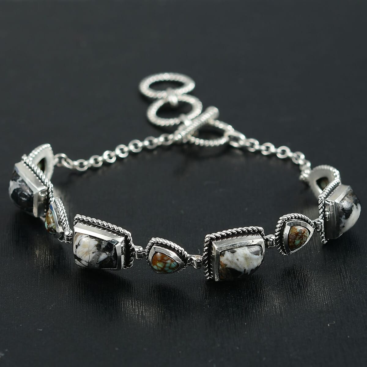 D’Joy Artisan Crafted White Buffalo and Blue Horizon Turquoise 11.70 ctw Bracelet in Sterling Silver (6.50-8.0In) image number 1