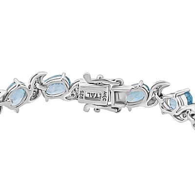 D'Joy Premium Cambodian Blue Zircon and Moissanite 15.50 ctw Whispers in Blue Bracelet in Rhodium Over Sterling Silver (6.50 In)