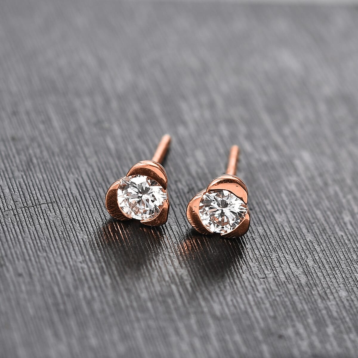 Luxuriant Lab Grown Diamond E-F VS 0.50 ctw Solitaire Stud Earrings in 18K Vermeil Rose Gold Over Sterling Silver image number 1