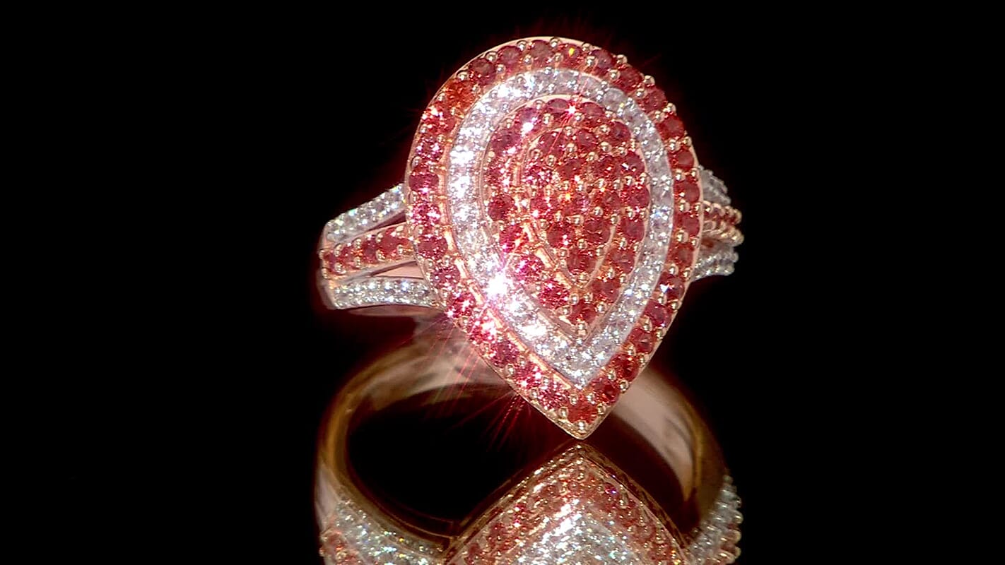 D’Joy Padparadscha Sapphire, White Zircon Ring in 18K Vermeil RG Over Sterling Silver (Size 10.0) 1.75 ctw