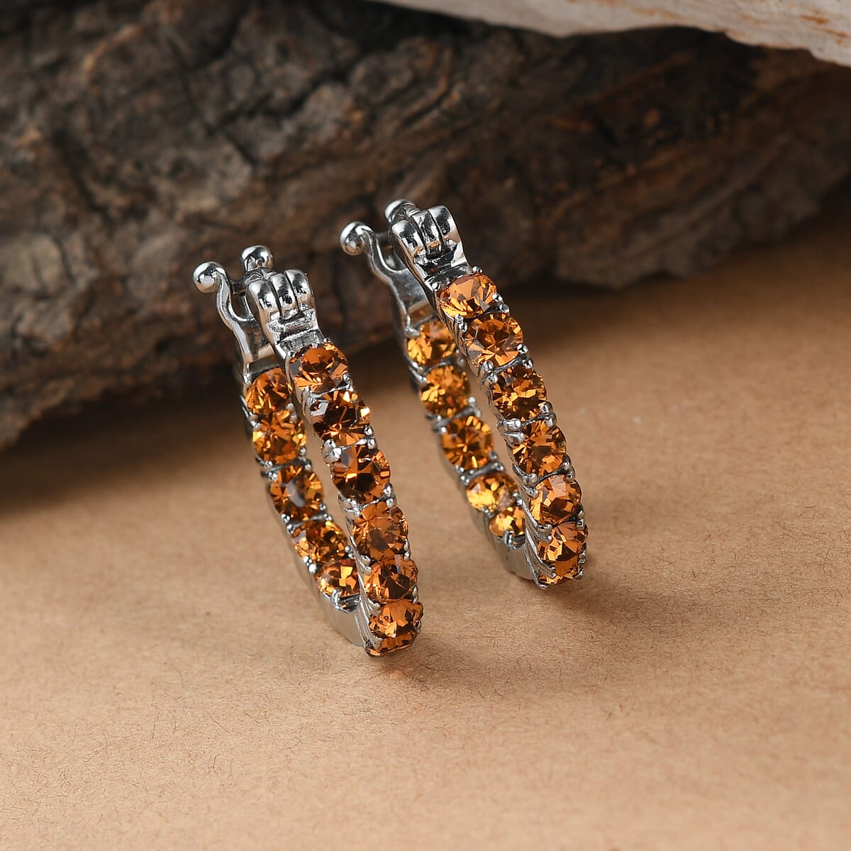 J Francis Embellished with Topaz Crystal by Swarovski Hoop Earrings in Stainless Steel image number 1