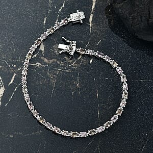 D&rsquo;Joy Madagascar Color Change Garnet and Moissanite 7.30 ctw Classic Tennis Bracelet in Rhodium Over Sterling Silver (8.00 In)