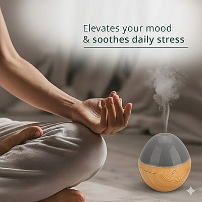 Livmore Aroma Diffuser with Colorful Light Changing and 5 Essential Oil (300ml)