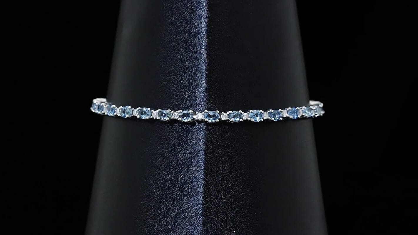 D’joy Santa Maria Aquamarine and Moissanite 4.90 ctw Bracelet in Rhodium Over Sterling Silver (7.25 In)