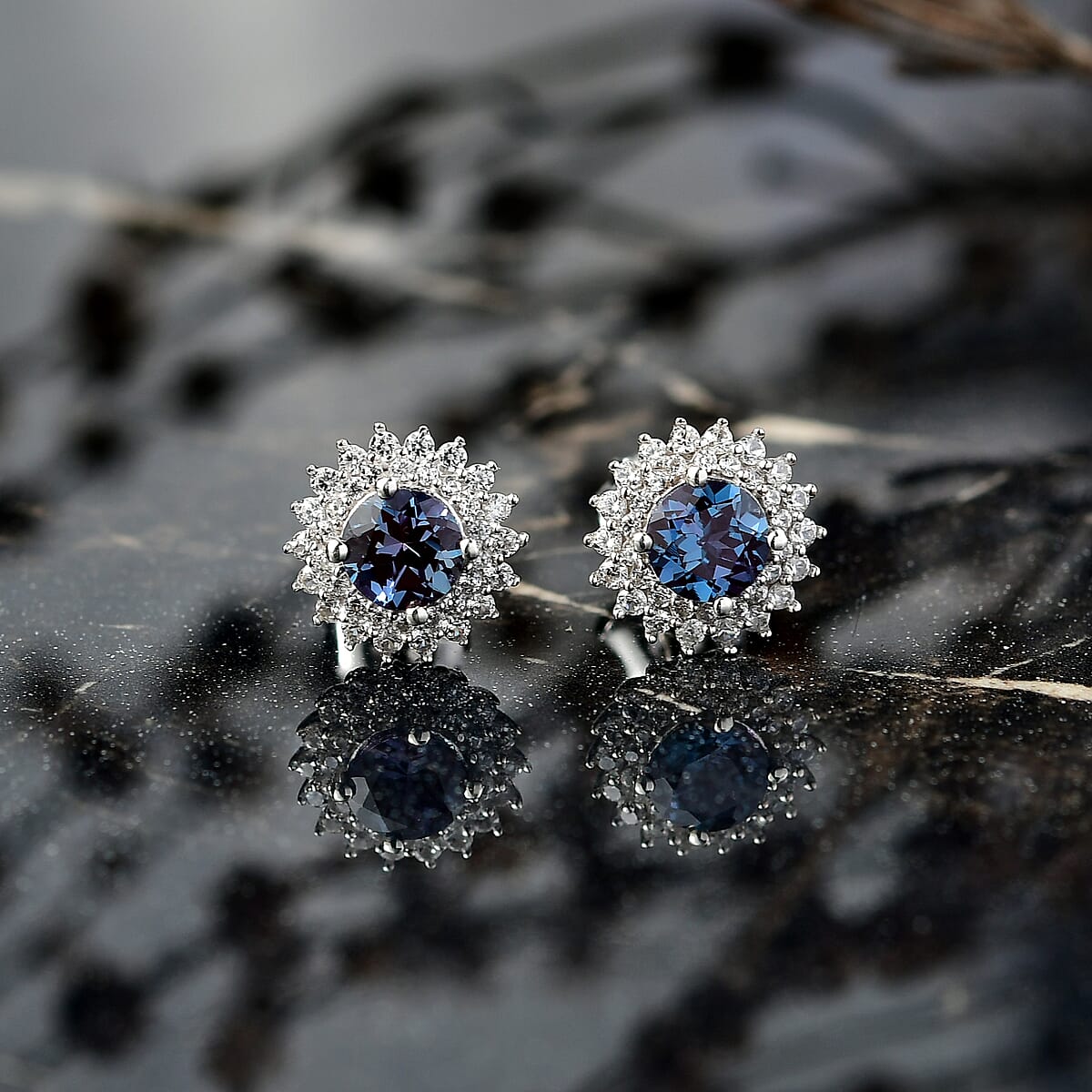 Luxuriant Lab Grown Alexandrite and White Zircon 2.20 ctw Daybreak Halo Earrings in Rhodium Over Sterling Silver image number 1