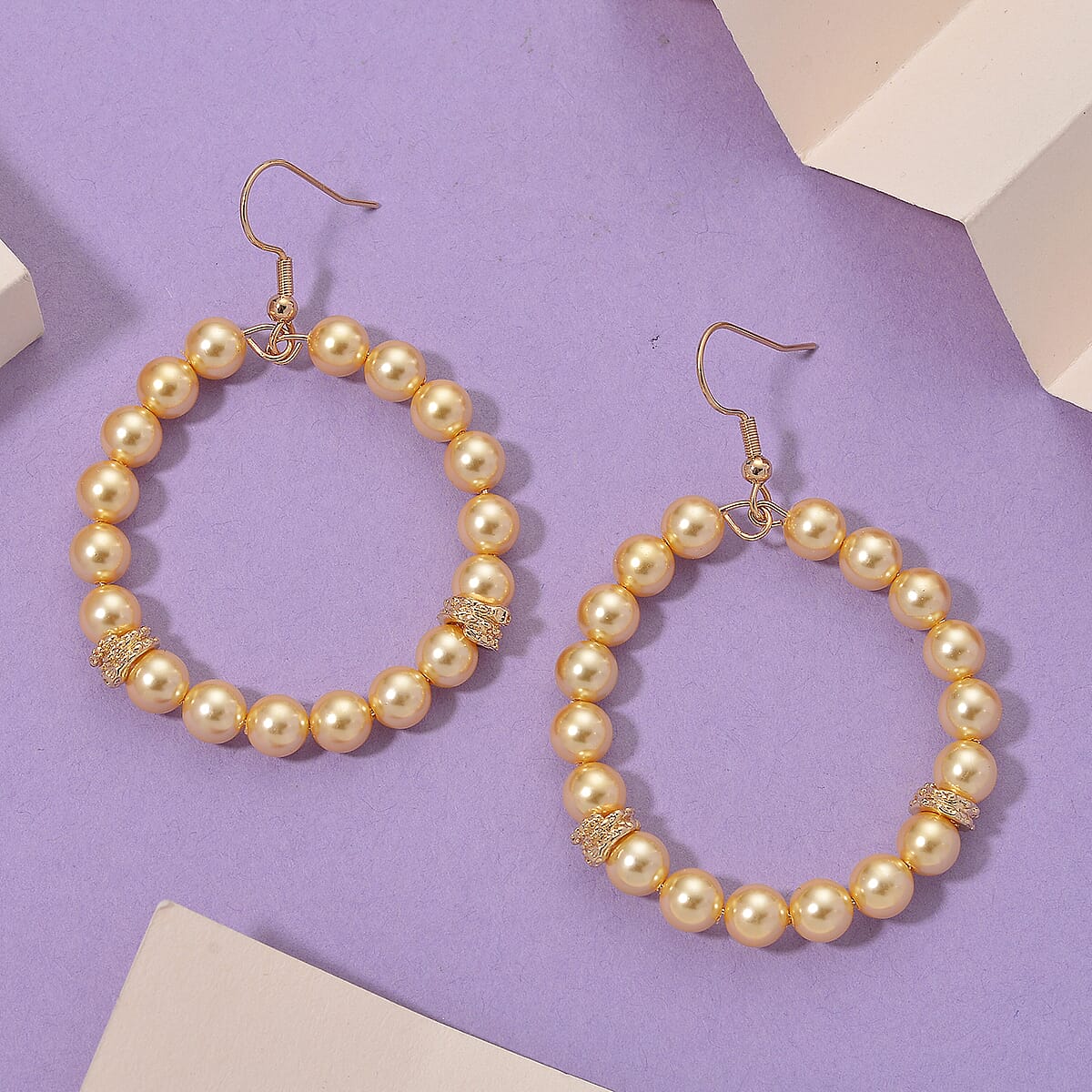 Lumina Pearl Golden Color Hoop Earrings in Goldtone and ION Plated YG Stainless Steel image number 1