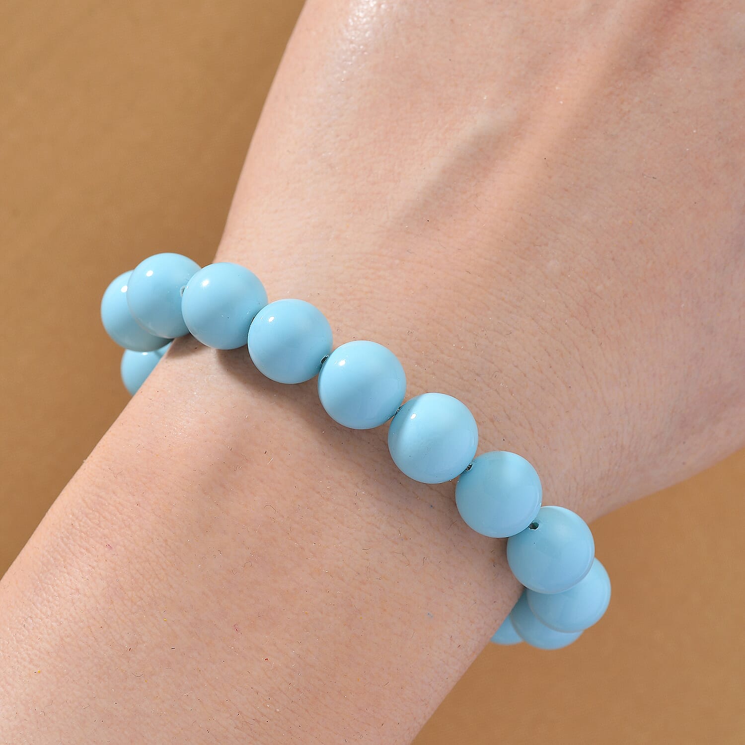Sleeping Beauty Color Shell Pearl and Simulated Diamond Bracelet in Silvertone (7.50 In)