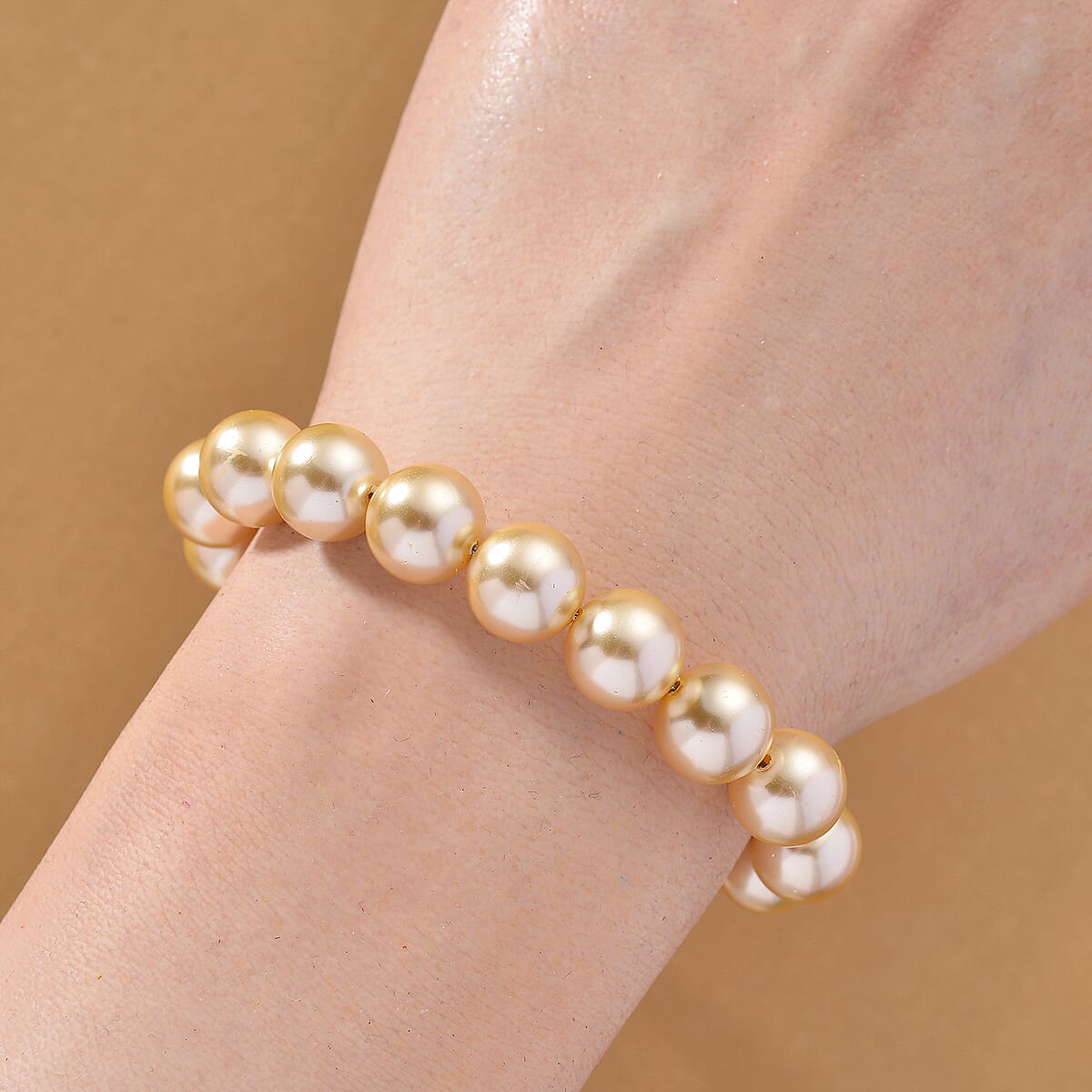 Golden Shell Pearl and Simulated Diamond Bracelet in Goldtone (7.50 In) image number 1