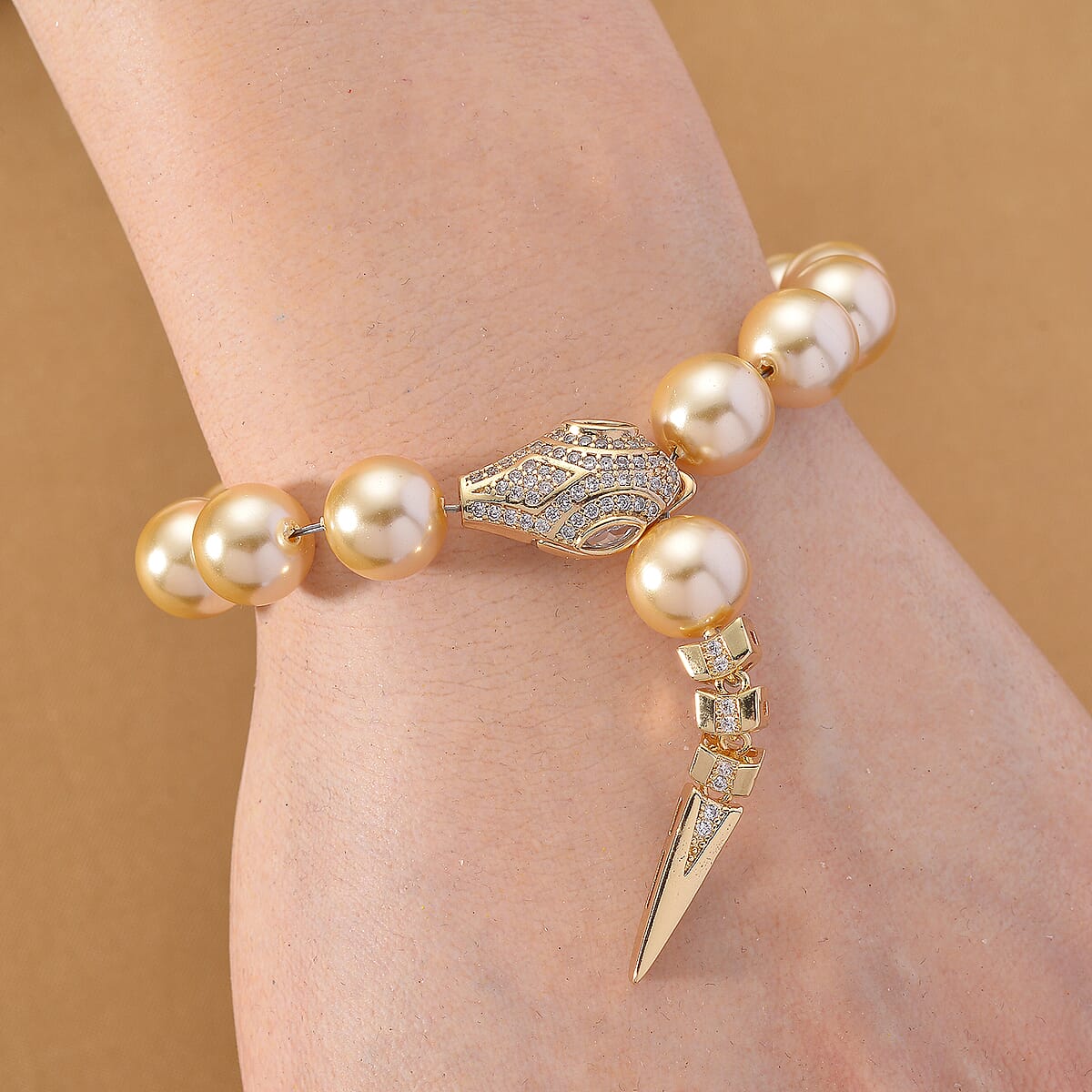 Golden Shell Pearl and Simulated Diamond Bracelet in Goldtone (7.50 In) image number 2