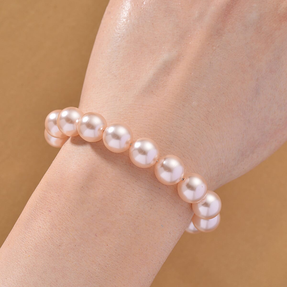 Pink Shell Pearl and Simulated Diamond 1.50 ctw Bracelet in Rosetone (7.50 In) image number 1
