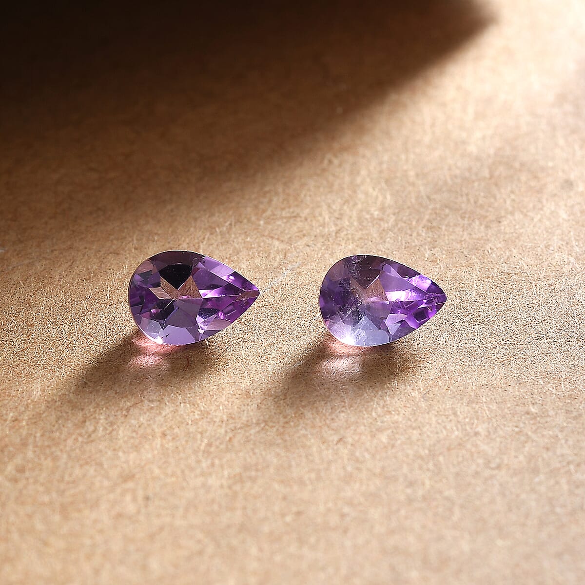 Bolivian Amethyst Set of 2 (Pear 7x5 mm) 1.07 ctw Loose Gemstone image number 1