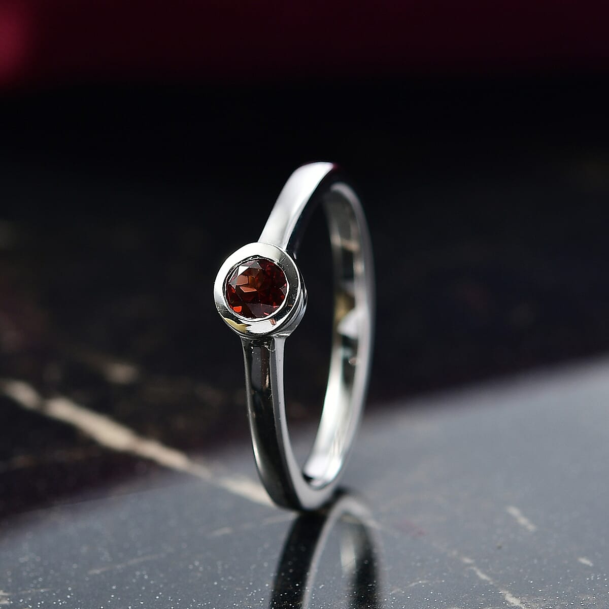 D'Joy Poke Free Mozambique Garnet 0.35 ctw Solitaire Ring in Rhodium Over Sterling Silver (Size 10.0) image number 1