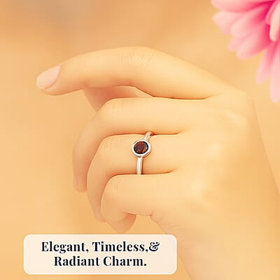 D'Joy Poke Free Mozambique Garnet 0.35 ctw Solitaire Ring in Rhodium Over Sterling Silver (Size 10.0)