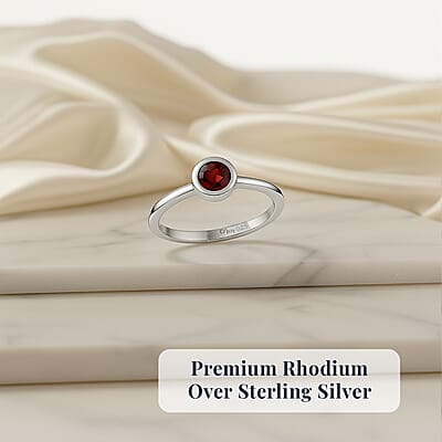 D'Joy Poke Free Mozambique Garnet 0.35 ctw Solitaire Ring in Rhodium Over Sterling Silver (Size 10.0)