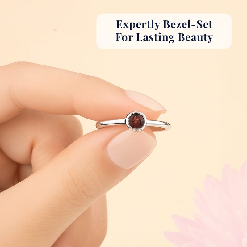 D'Joy Poke Free Mozambique Garnet 0.35 ctw Solitaire Ring in Rhodium Over Sterling Silver (Size 10.0)