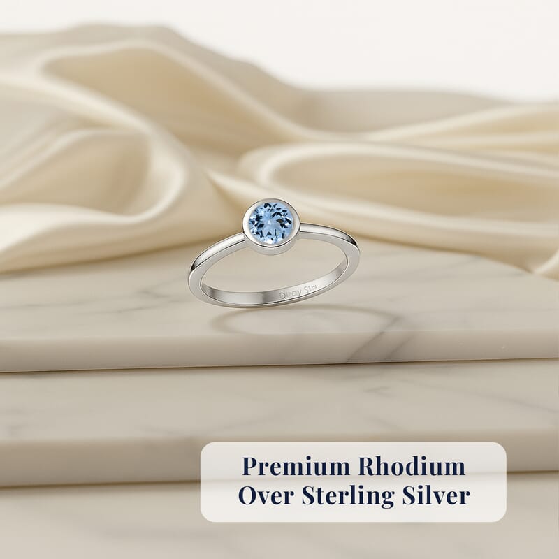 D'Joy Poke Free Premium Mangoro Aquamarine 0.25 ctw Solitaire Ring in Rhodium Over Sterling Silver (Size 10.0)
