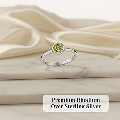 D'Joy Hebei Peridot Poke Free Solitaire Ring in Rhodium Over Sterling Silver 0.30 ctw (Size 10.0)